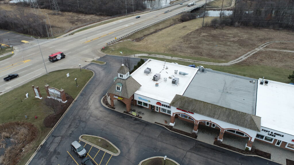 Saratoga Shopping Center, Gurnee, IL, sections of low slope commercial reroof