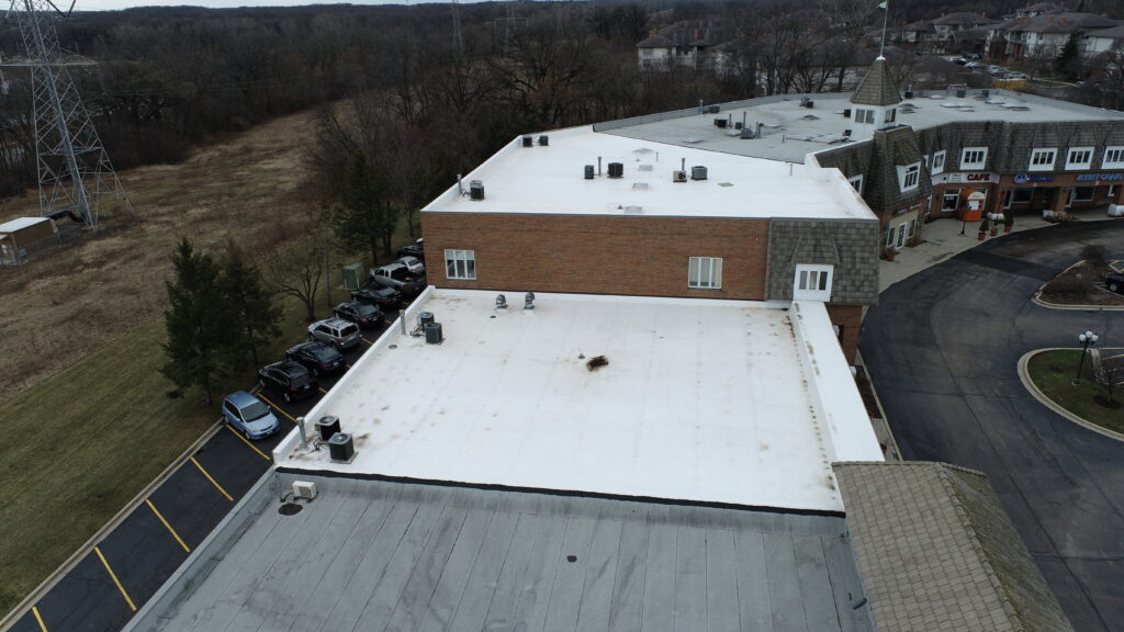 Saratoga Shopping Center Gurnee, IL commercial roof replacement by section